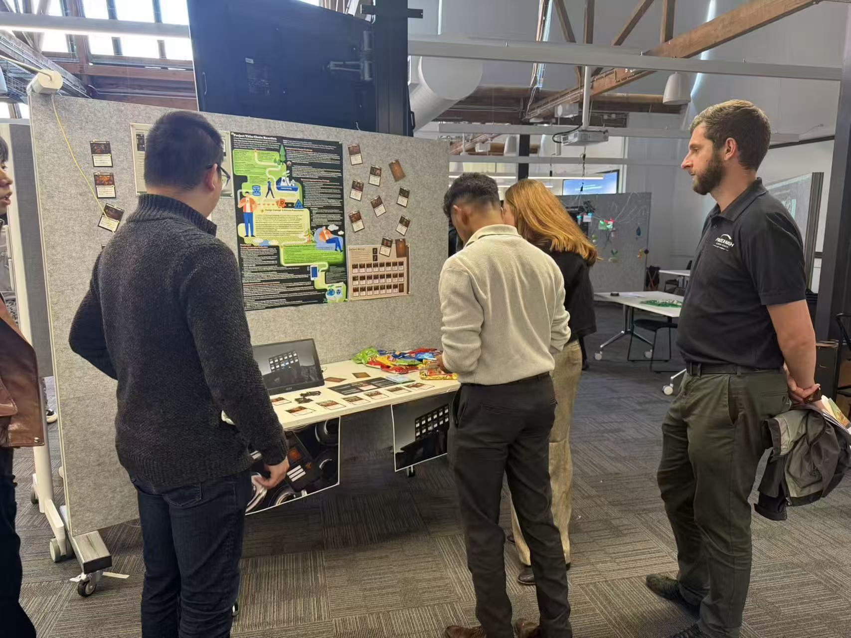 People reviewing the Energy Transition System during a studio presentation